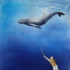 Aquarelle originale de Renaud Prégaldiny, artiste peintre aquarelliste Français. Petite fille qui joue avec une baleine. Scène onirique sous l'océan.