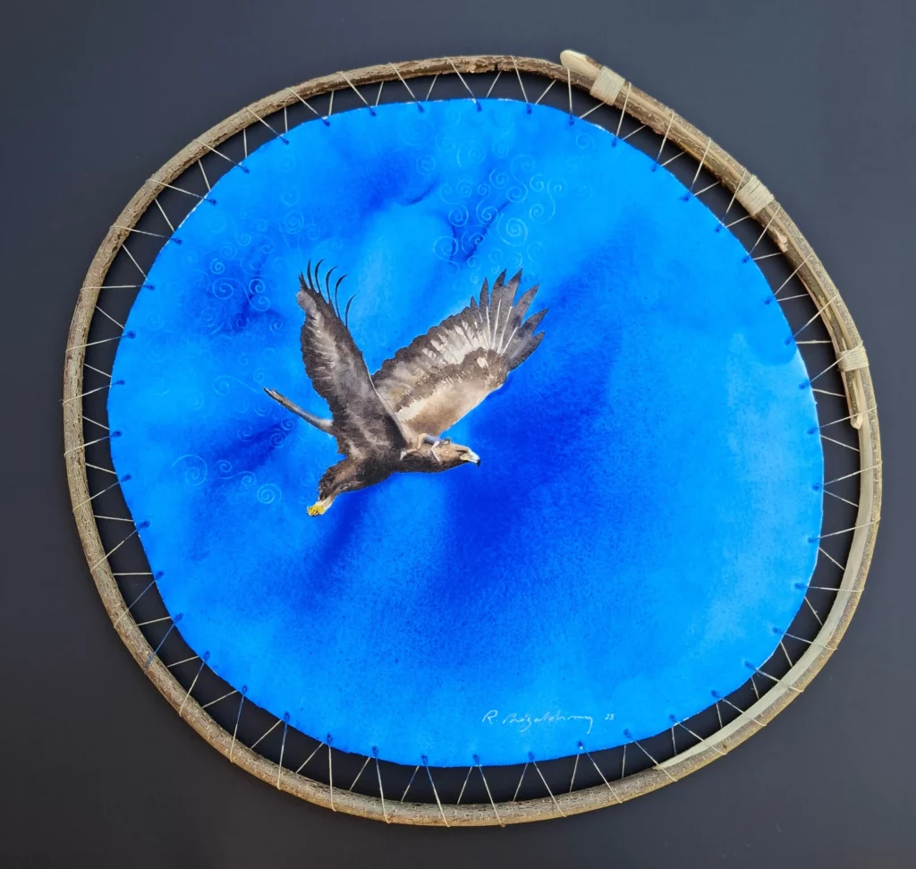 Aquarelle originale de Renaud Prégaldiny. Aigle royal en vol avec une jeune fille sur son cou. Oeuvre sur papier arches 300gr tendue sur baguette de noisetier.